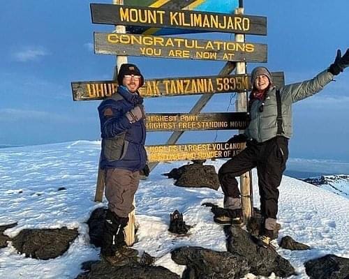 Snow-capped Mount Kilimanjaro above the clouds