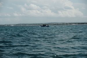 A sightseeing boat on a scenic ocean tour near Dar es Salaam. Perfect for travel and adventure enthusiasts.